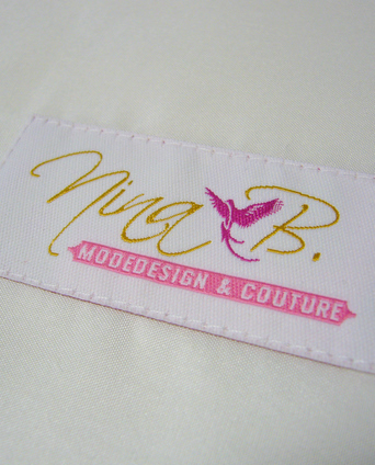 Brautmode aus Seidentaft-Etikett nina B. Modedesign