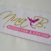 Brautmode aus Seidentaft-Etikett nina B. Modedesign